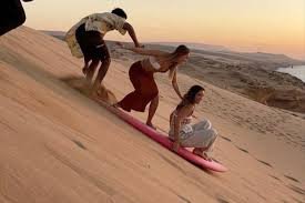 Sandboarding Adventure – Glide Across Morocco’s Golden Dunes (Half-Day Experience)